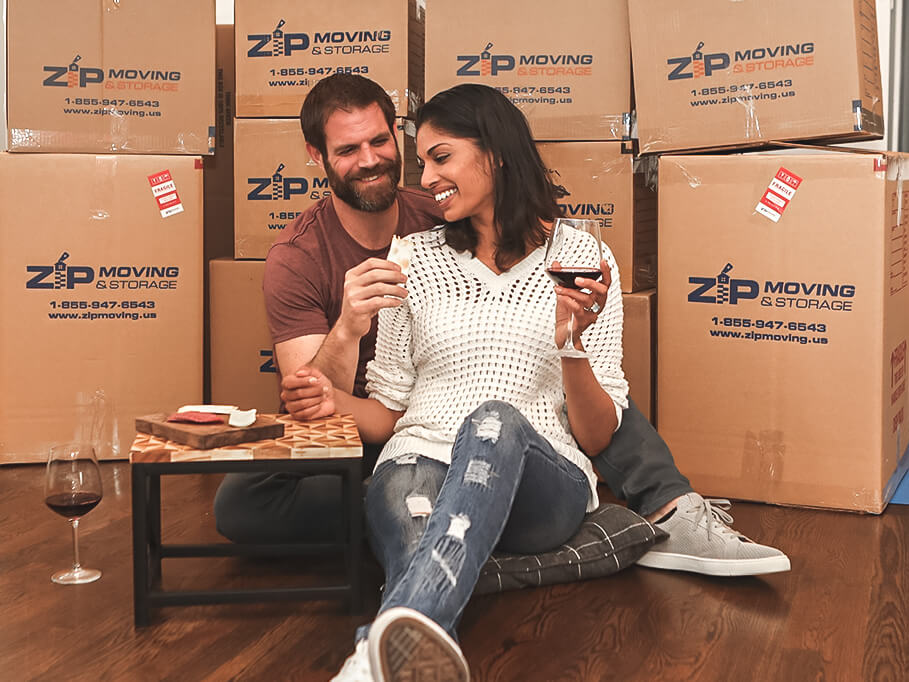 Zip Moving and Storage packing happy couple.