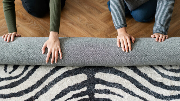 How to roll a rug for moving