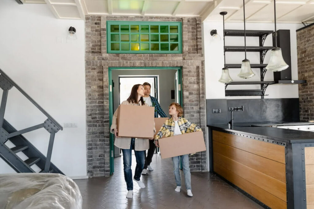 A family of three moving into a new home in Columbia